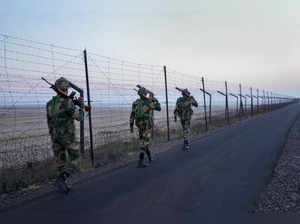 Kutch: Border Security Force (BSF) personnel patrol on eve of New Year at Khardo...