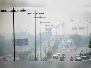 Vehicles ply on road amid heavy smog condition, in New Delhi on Friday, Oct. 28, 2022.  (Photo: Qamar Sibtain/IANS)
