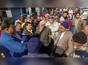 Haldwani: Residents during a protest against the Uttarakhand High Court's order ...
