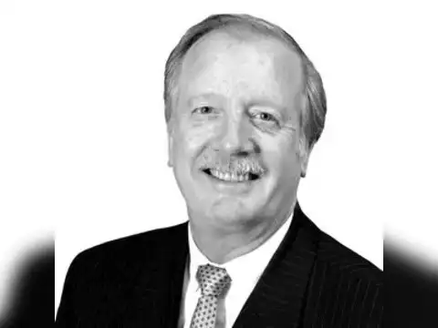 Who is  Lawrence G. McMillan?