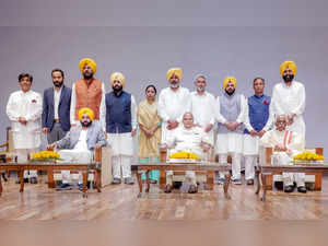 Chandigarh: Governor of Punjab Banwarilal Purohit with Punjab CM Bhagwant Mann a...