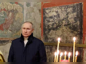 Russian President Vladimir Putin attends the Orthodox Christmas service in Moscow