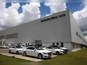 FILE PHOTO: Mercedes-Benz cars parked at the company's assembly plant in Chakan, India