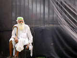 Supporter of Anna Hazare sits on a chair at the Ramlila grounds