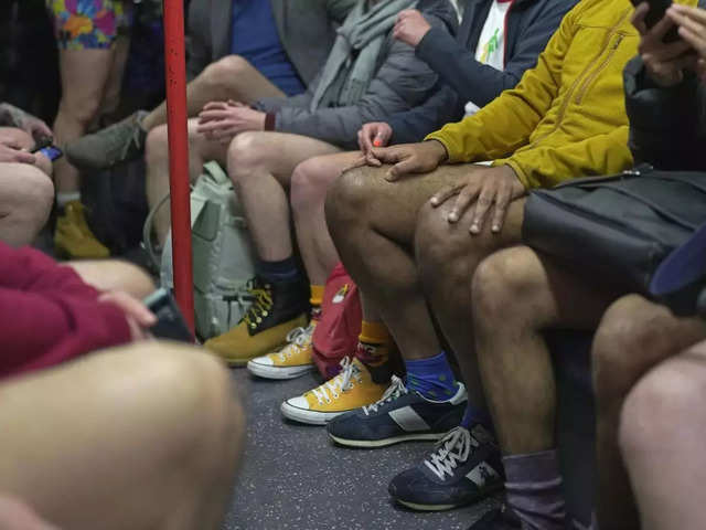 London Underground London UK 12th Jan 2020 People take part in the  11th No Trousers Tube Ride event on the London underground without  wearing trousers The No Pants Subway Ride is an
