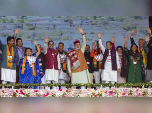 Kangra, Nov 09 (ANI): Prime Minister Narendra Modi with Himachal Pradesh BJP pre...