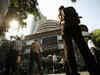 Indian shares open flat; Reliance Comm up 2%