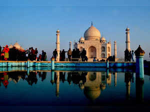 Agra: Tourists visit the Taj Mahal in Agra. (PTI Photo)(...