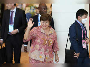 IMF Managing Director Kristalina Georgieva waves as she arrives to attend the AP...
