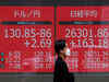 Tokyo shares jump after Bank of Japan keeps policy unchanged