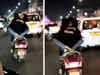Lucknow: ‘Lovebirds’ romance on scooter, driver detained after video goes viral, watch!