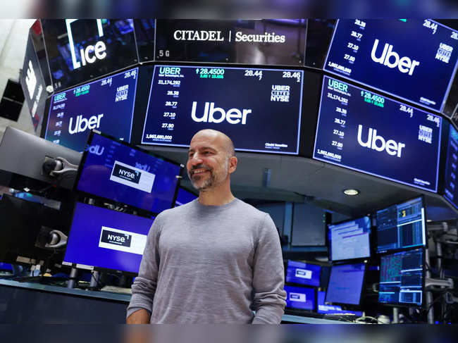 Uber CEO Dara Khosrowshahi looks on the trading floor at the New York Stock Exchange (NYSE) in Manhattan, New York City