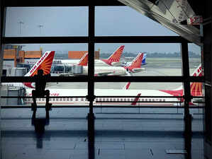 Indian held for unruly behavior with woman on airline flight