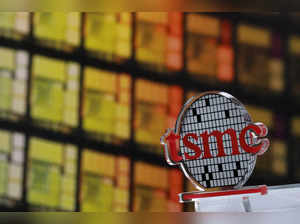 FILE PHOTO: A logo of Taiwan Semiconductor Manufacturing Co (TSMC) is seen at its headquarters in Hsinchu