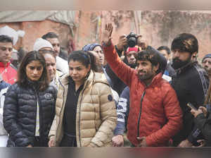 New Delhi: Wrestlers Vinesh Phogat, Sakshi Malik and Bajrang Punia during their ...