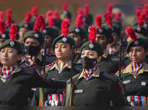 New Delhi: Women cadets of NCC march past during rehearsals for the Republic Day...