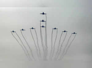Kalaikunda: Surya Kiran, the Indian Air Force's aerobatics team, performs during...