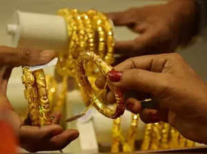 Agartala:Women select gold jewellery at a showroom on the occasion of Dhanteras festival in Agartala on Saturday October 21,2022.(Photo:Abhishek Saha/IANS)