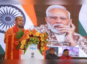 Varanasi: Uttar Pradesh Chief Minister Yogi Adityanath addresses during the flag...