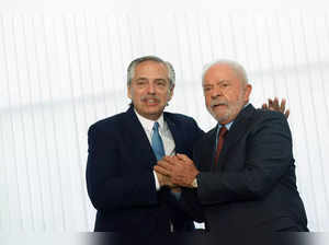 Argentina's President Alberto Fernandez greets Brazil's President Luiz Inacio Lula da Silva at the Itamaraty Palace in Brasilia