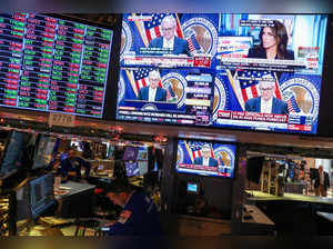 FILE PHOTO: Federal Reserve Chair Jerome Powell interest rate announcement on the trading floor at New York Stock Exchange (NYSE) in New York City