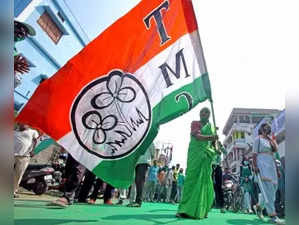 Trinamool Congress supporters wave party flags after winning Municipal Election in Bolpur in Birbhum District on Wednesday February 02,2022. (Photo: Abhijit Saha/IANS)