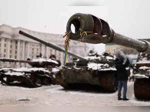 Ribbons with the colours of the Ukrainian flag are tied to the cannon of a destroyed Russian tank at an exhibition displaying destroyed Russian military vehicles, amid Russia's invasion of Ukraine, in Kyiv