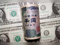 Dollar drops vs yen, near 9-month low to euro on central bank bets