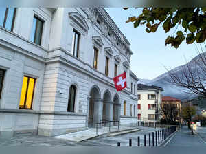 FILE PHOTO: Switzerland's national flag is displayed on the Swiss Federal Criminal Court building in Bellinzona