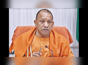 Uttar Pradesh CM Yogi Adityanath's aid to kin of scribes who died of Covid