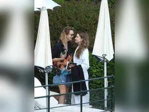 Cara Delevingne and girlfriend Minke enjoy date night in California, attend Harry Styles concert