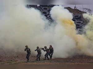 Akhnoor: Indian Army soldiers during a drill at firing range at Line of Control ...