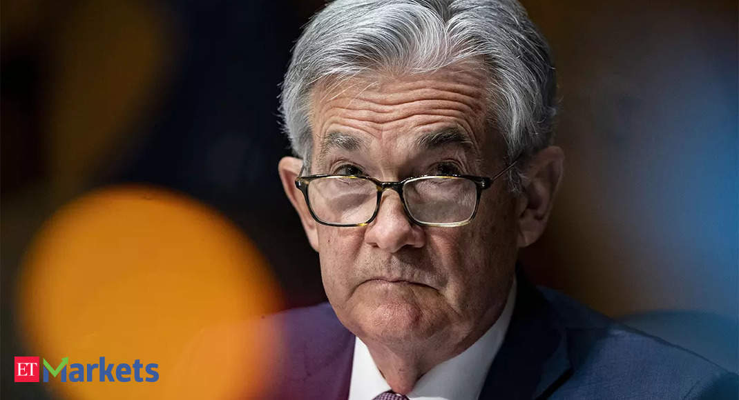Fed slows rate hikes, signals further increases are coming