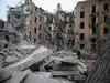 Russian missile wrecks apartment block, killing 3, as EU leaders visit Kyiv