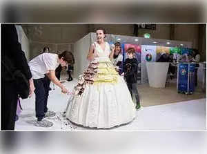 Swiss baker sets Guinness World Record for creating World's largest wearable cake; Watch video