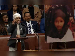 Democratic Party member of the House of Representatives Ilhan Omar speaks on Thursday before it voted to oust her from its Foreign Affairs Committee. Next to her is a portrait of her as a child. (Photo Source: House TV)