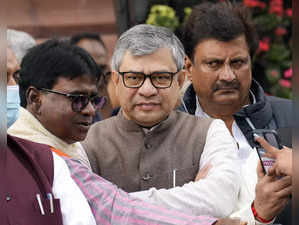New Delhi: Union Railways Minister Ashwini Vaishnaw and other BJP members wait f...