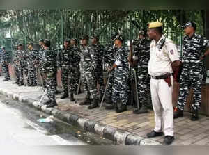 New Delhi: Delhi Police and security personnel stand guard outside the Jamia Millia Islamia College as section 144 imposed in Jamia Nagar during the raids at PFI's offices in the national capital, in New Delhi, Tuesday, Sept. 27, 2022. (Photo: Wasim Sarvar/IANS)