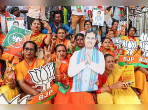 Agartala: Supporters of Tripura Chief Minister and BJP leader Manik Saha while h...