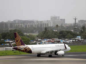 A Vistara Airbus A320 passenger aircraft prepares for takeoff at Chhatrapati Shivaji International airport in Mumbai
