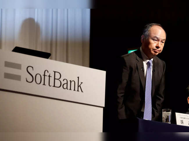 FILE PHOTO: FILE PHOTO: Japan's SoftBank Group Corp Chief Executive Masayoshi Son attends a news conference in Tokyo