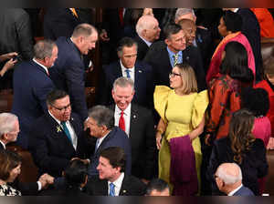 Senator Kyrsten Sinema gets trolled on Twitter for wearing yellow dress to State of the Union address