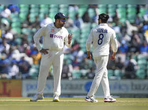 Indian captain Rohit Sharma with teammate Ravindra Jadeja during the 1st...