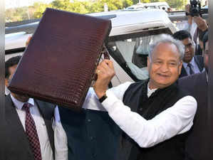 Jaipur: Rajasthan CM Ashok Gehlot displays a briefcase at Vidhan Sabha to present the State Budget in Jaipur on Friday, Feb. 10, 2023. (Photo: Twitter)