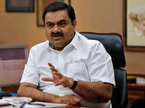 Adani Group says business plan fully funded, will deliver superior returns to shareholders