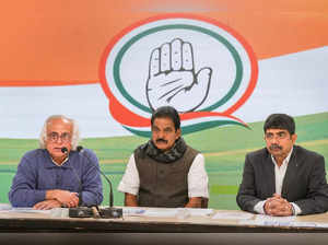 New Delhi: Congress leaders Jairam Ramesh, K.C. Venugopal and Vineet Punia durin...