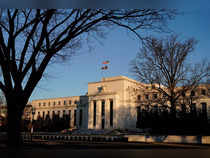 Fed seen raising rates to 5.1%, then may stop