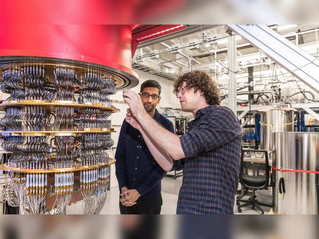 FILE PHOTO: A handout picture shows Pichai and Sank with one of Google's Quantum Computers in the Santa Barbara lab