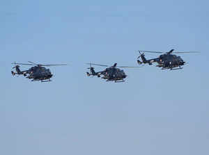 Bengaluru: Indian Army's advanced light helicopters (ALH) fly past during the in...