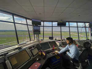 Chennai: An Air Traffic Control (ATC) specialist operates from the ATC tower in ...
